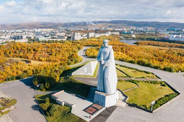Aerial view of Alyosha Monument in Murmansk, Russia. Panoramic city view from above in sunny autumn day