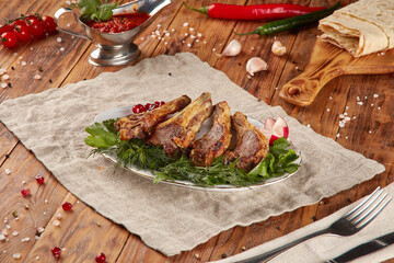 Grilled lamb rack BBQ, wood background