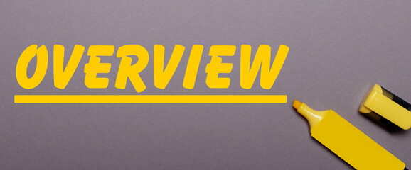 On a gray background, yellow marker and yellow inscription OVERVIEW