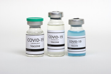 COVID-19 vaccine ampoule isolated on a white