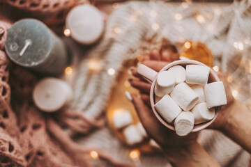 Christmas card with marshmallows and candles