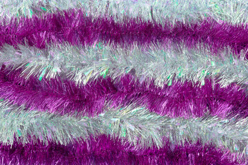 Christmas Purple Shiny Tinsel Garland for Holiday Decoration Background