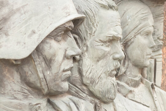 Russia Kursk 21.07.2019 - a memorial plaque with a bust of military soldiers near the Arc de Triomphe in Kursk dedicated to the victory over fascism