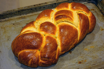 A braided challah brioche bread