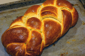 A braided challah brioche bread