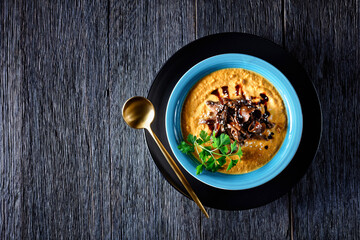 Pumpkin soup with wild mushrooms, copy space