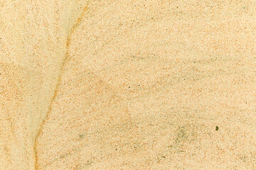 Apply sand rubbing plaster to masonry on concrete. Clean sand textured plaster surface texture.