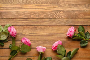 Naklejka na ściany i meble Beautiful pink roses on wooden background