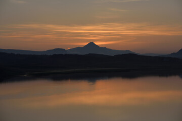 Sunrise view at Icelandic misty coast