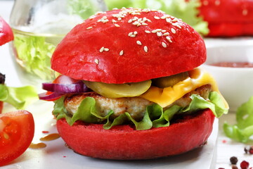Burgers with red bun and cutlet