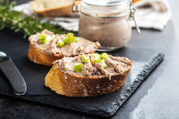 Liver pate on sliced baguette.