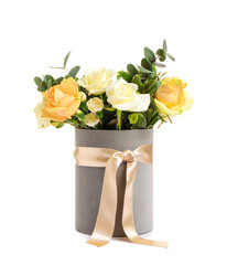 Gift box with beautiful flowers on white background