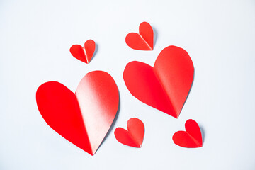 Red paper hearts isolated on white background