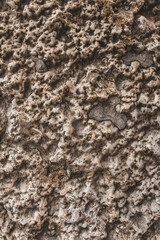 Rough embossed stone surface texture - background