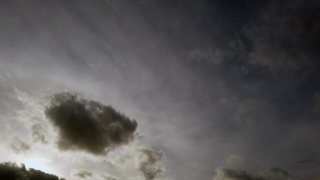 Fantastic sky with wonderful sunrise sunlight and fluffy cirrus floccus clouds and relaxing atmosphere