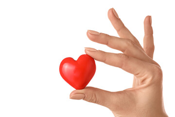 Obraz premium Hand with red heart on white background