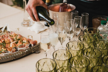 Catering banquet table at wedding reception. Restaurant presentation, european cuisine, food...