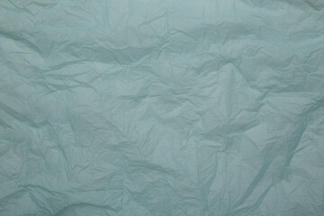 Blue paper background closeup view