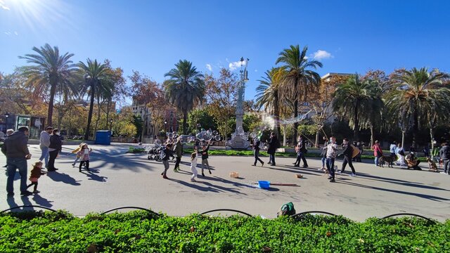 kids playing with soap bubble at the Citadel Park, the Ciutadella Park is the largest park in Barcelona. Spain
