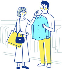 洋服の買い物を楽しむカップル