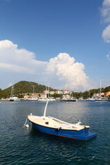 Fototapeta na wymiar Small fishing boat in the picturesque bay on island Lastovo, Croatia.