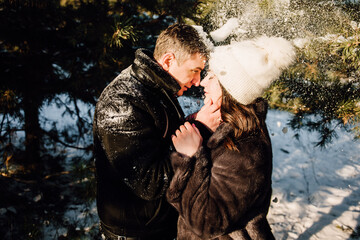 Fototapeta na wymiar couple in winter forest
