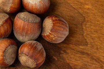 composition of hazelnuts on a wooden board