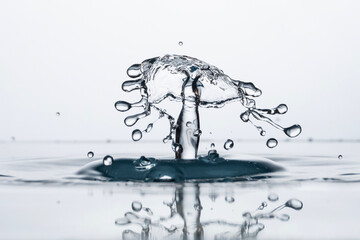 Freeze water liquid drop splash on pure background