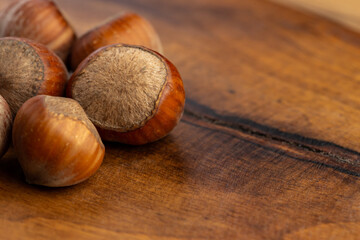 composition of hazelnuts on a wooden board