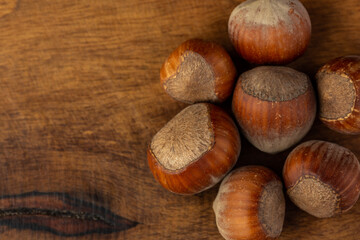 composition of hazelnuts on a wooden board