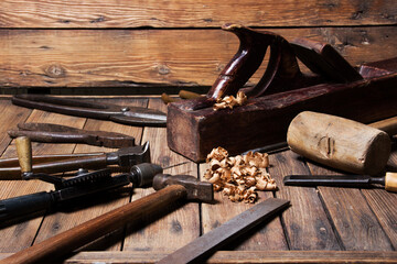 Set of tools over wooden panels