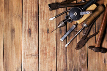 old equipment tools group set on grain wood