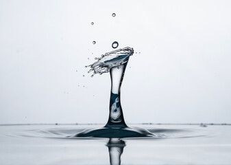 Freeze water liquid drop splash on pure background