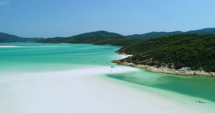 4K aerial forward tracking low angle motion over the white sands of Hill Inlet at Whitehaven Beach,Whitsundday Islands,Queensland,Australia