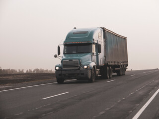 Fototapeta na wymiar Old Lorry Traffic Transport on motorway in motion