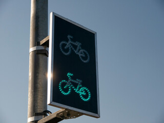 Green Traffic light with a bicycle icon, Bike friendly politics concept.