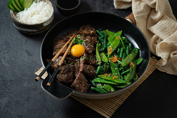 Homemade Barbecue Korean Beef Bulgogi, grilled beef steak with spicy sauce, copy space