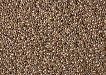 Beautiful golden beads.Abstract bacground.Invitation card.