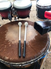 djembe drum with bongos and a cowbell