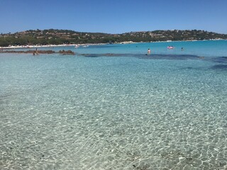 Caribbean beach with blue and turquoise water in summer for summer holidays