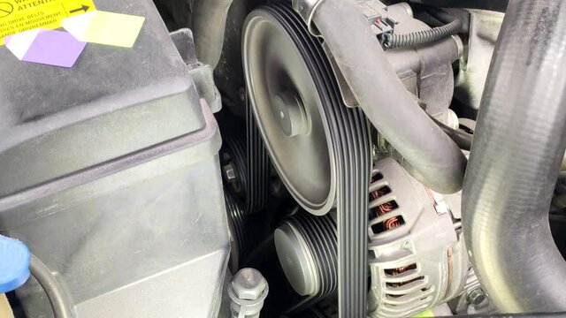 engine starting. rotation of the belt. generator and power steering. machine operation. warning sign