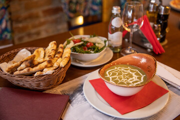 Cream of broccoli soup served in the restaurant
