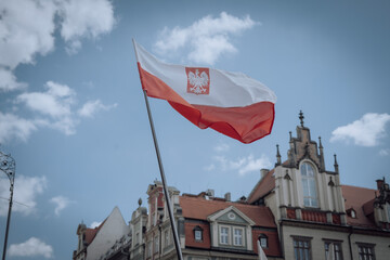 Polish flag waving over the crowd 