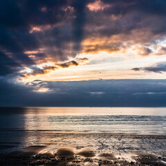 beautiful clouds over the sea. stormy sky with warm tones on Re island