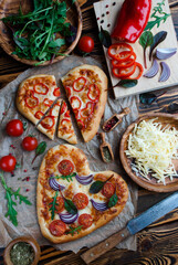 traditional italian pizza with paprika, mozzarella and tomatoes,  Valentine`s Day, heart shaped pizza