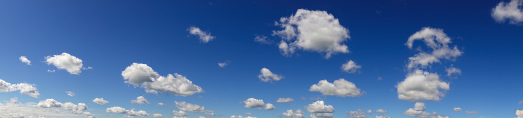 Fototapeta premium Panorama. Beautiful blue sky and white clouds.