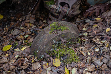 Abandoned metallic stuff on the car cemetery of Kyrkö Mosse in Sweden