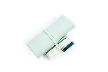 soft water bottle isolated white background. collapsible liquid container. travel equipment