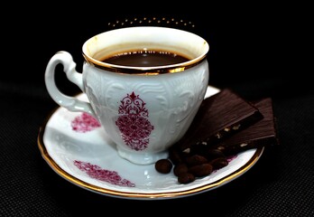Cup of coffee with chocolate 