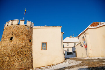Gothic Fortress walls, Putim Gate in winter sunny day, Medieval fortifications, historical architectural monument Putimska brana, citadel, Pisek, Southern Bohemia, Czech Republic